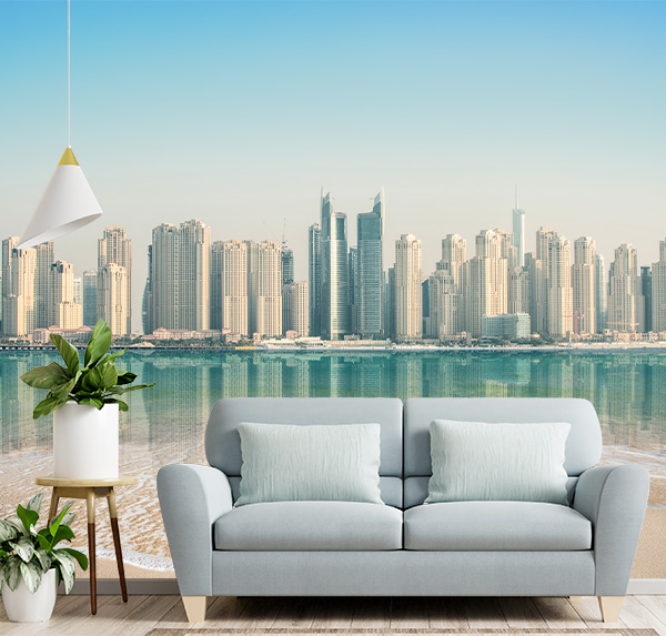 A peaceful beach scene with calm waters and a city skyline, perfect for stylish wallpaper decor blending natural tranquility with urban energy.