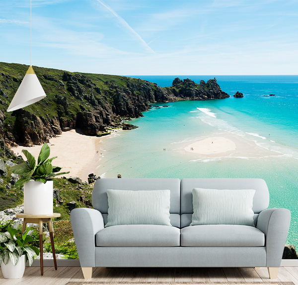 Pedn Vounder Beach, South Cornwall. A breathtaking image of turquoise waters lapping a secluded white sand beach nestled between lush green cliffs